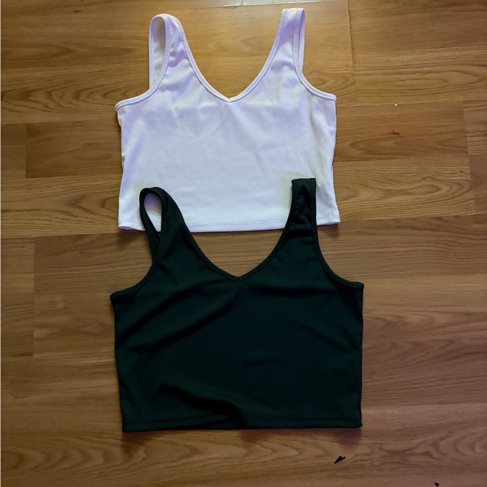 Cropped tank tops, thin.